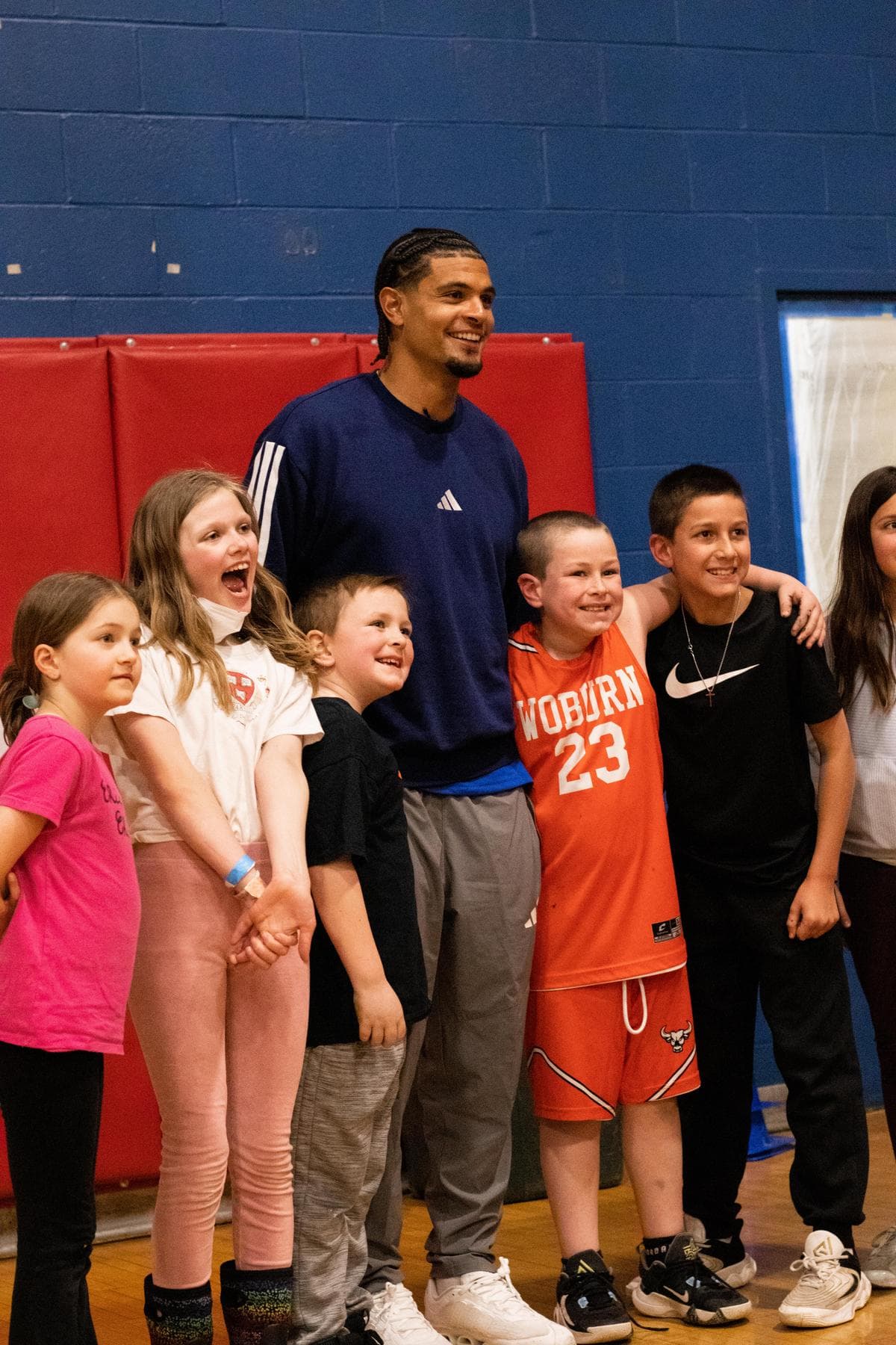 Miles Robinson with youth at Arlington Boys & Girls Club